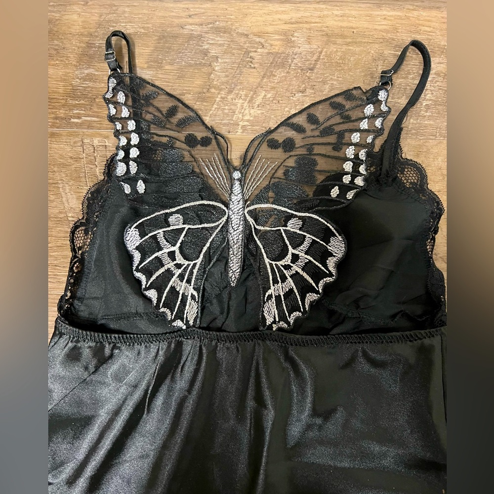 Black mini slip dress with butterfly back